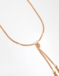 Long Gold Knot & Tassel Necklace - link has visual effect only