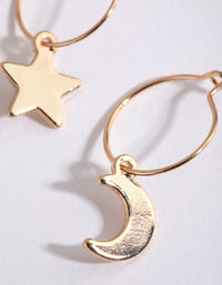 Gold Star & Moon Huggie Earrings - link has visual effect only