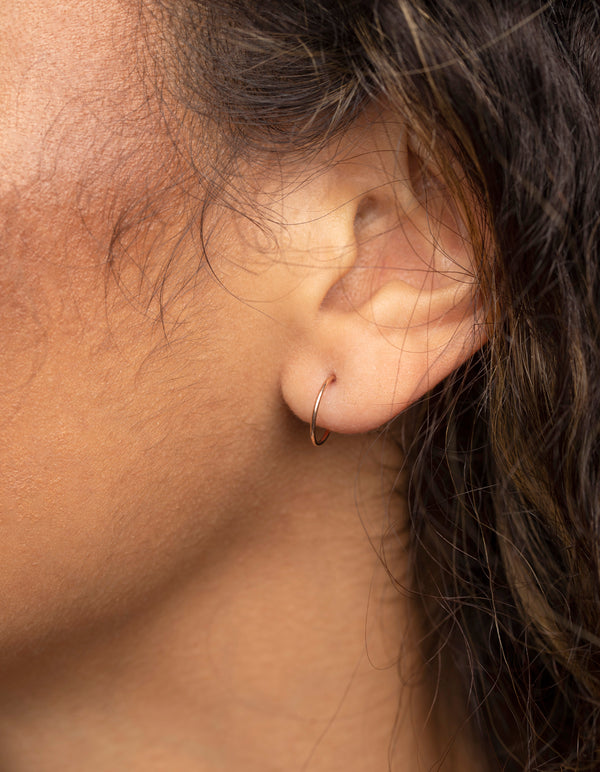 Tiny gold sleeper earrings online