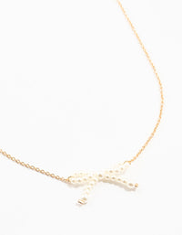 Gold Pearl Bow Necklace - link has visual effect only